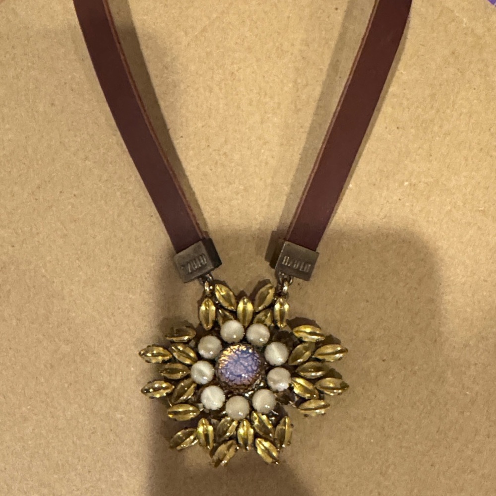 Gold and Brown Floral Pendant Necklace
Dress up or down.